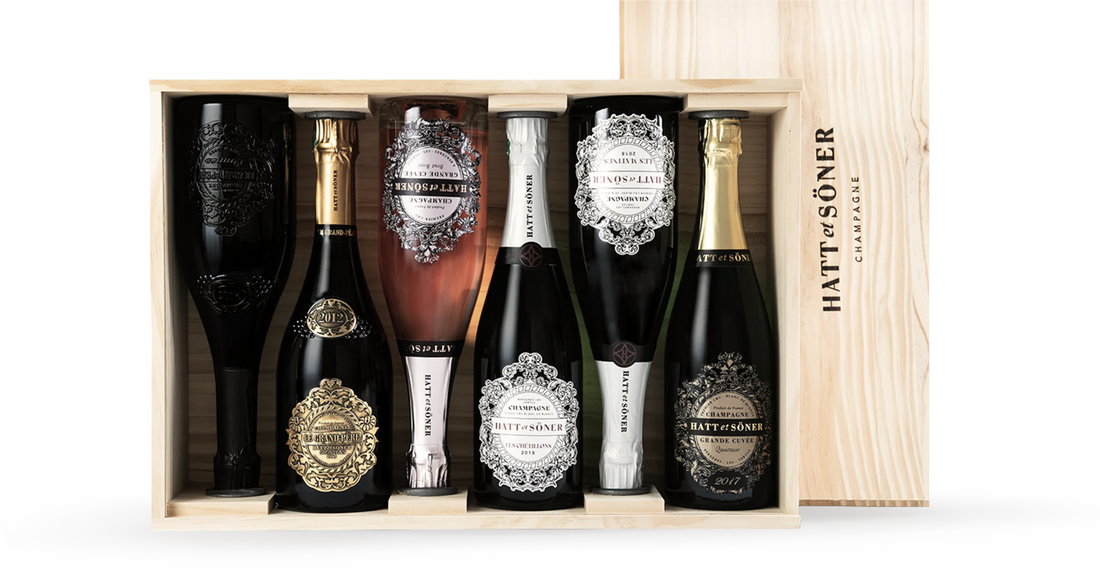 Variety of exclusive vintage champagne bottles in displayed in wooden box